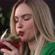 Blonde with Pleasure Drinking a Delicious Cocktail - VideoHive Item for Sale