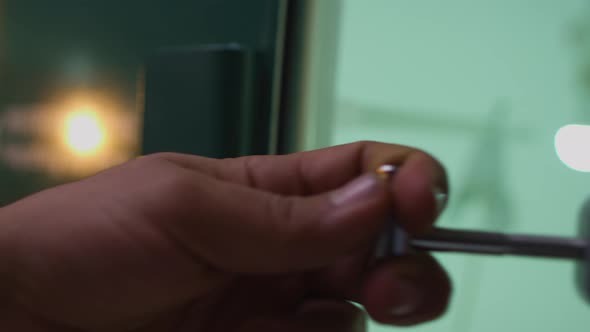 laboratory technician closes the cover of the photometric sphere alt