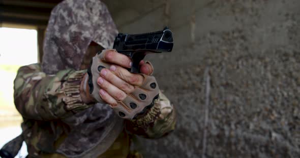 Mercenary Soldier Shooting From His Handgun During Special Operation