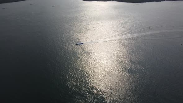 Ocean drone panning shot of ferry cruising