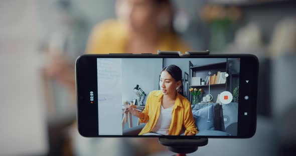 Asia lady english teacher video conference calling on smartphone. alt