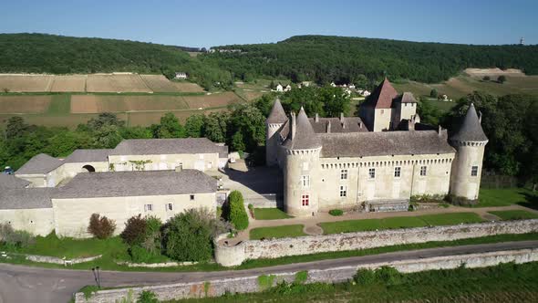 Aerial view of Chateau de Rully with vineyards in Burgundy, France