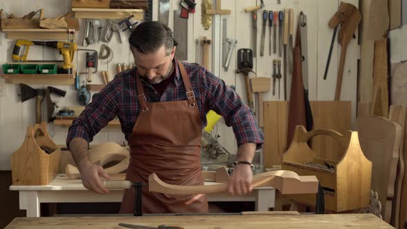 Cabinet Maker Begins his Working Day alt