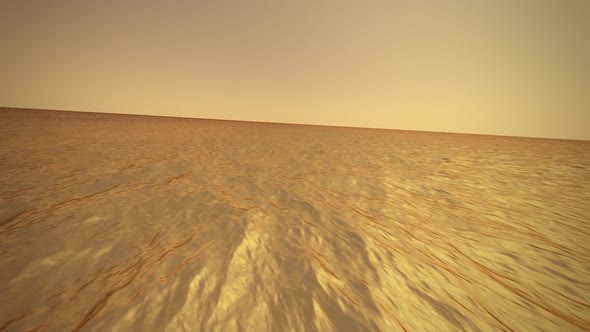 Animation with the top view of rippling golden water ocean. Symbol of richness. alt