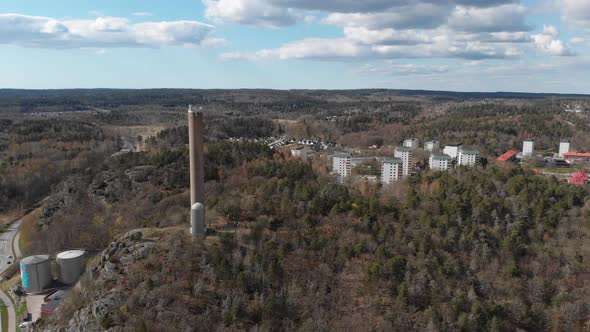 Industrial Chimney Rural Apartment Buildings In Boreal Forest Aerial alt