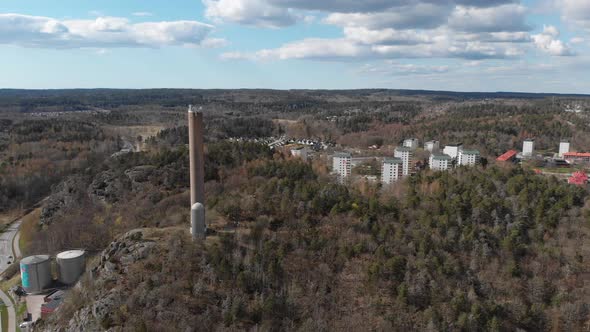 Industrial Chimney Rural Apartment Buildings In Boreal Forest Aerial