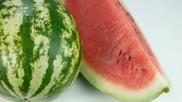 Watermelon Covered In Drops Of Water And A Delicious Slice