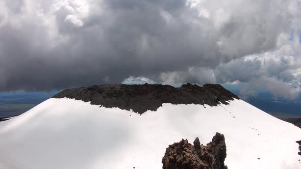 Time lapse of the crater of Mount Ngauruhoe with dark clouds. Tongariro National Park in New Zealand alt