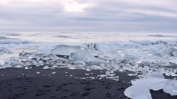 Ice and Surf on Diamond Beach Near Glacier Lagoon of Iceland alt