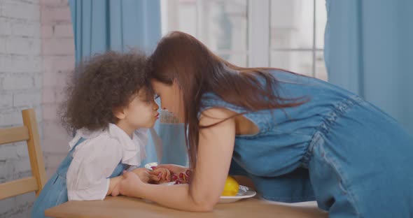 Happy family Mom is playing with her little daughter Turkish family alt