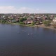 Aerial view of Stand Up Paddling on pond in provincial city 01 - VideoHive Item for Sale