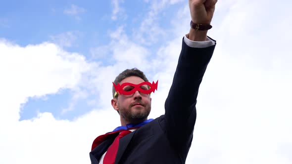 Successful Man in Hero Mask on Sky Background Leader Aspirations