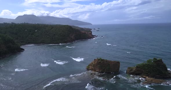 Aerial View Of The Wildlife Of Dominica, Flying Over The Rocks Off The Coast Of Calibishie alt