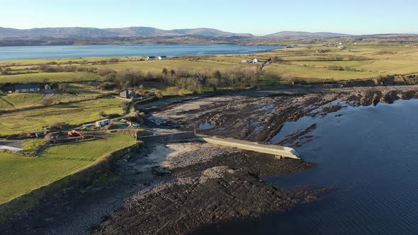 Aerial View of the Pier at Ballyederland By St Johns Point in County Donegal  Ireland alt