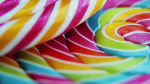 Background of Striped Spiral Multicolor Lollipop