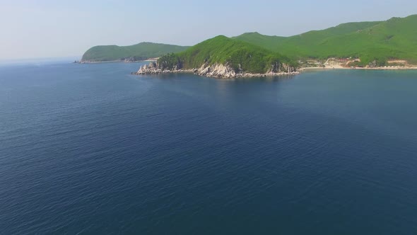 Drone View of the Beautiful Sea Coast with Clear Blue Water alt