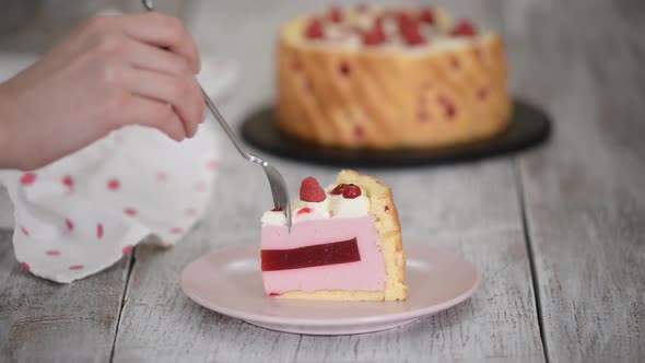 Piece of Layered Raspberry Mousse Cake