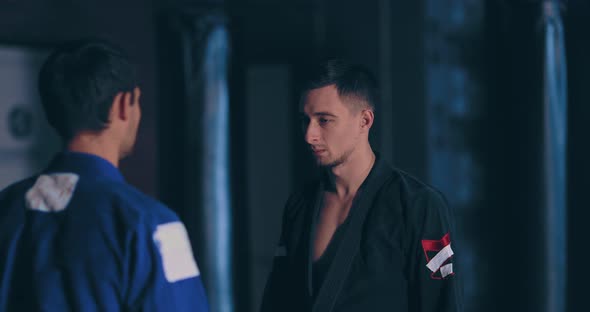 Young Fighters Look at Each Other Before the Fight Eye to Eye alt