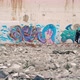 New generation of young people walking in front of graffiti. - VideoHive Item for Sale