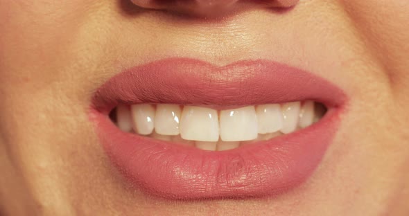 Smiling Mouth in Close-up. Lips Smiling in Closeup.