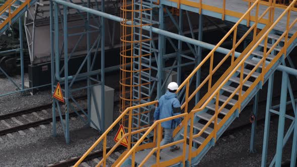 Professional Engineer Worker Walking in a Construction Manufacture