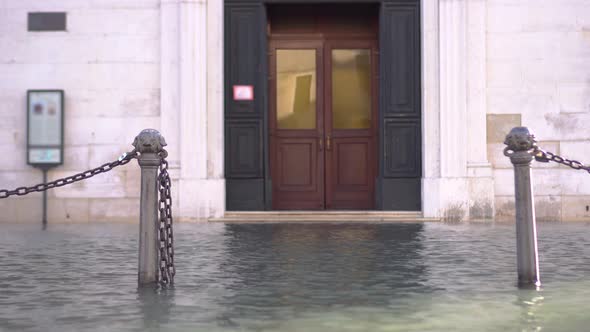 External Door of a Building Flooded with Water alt