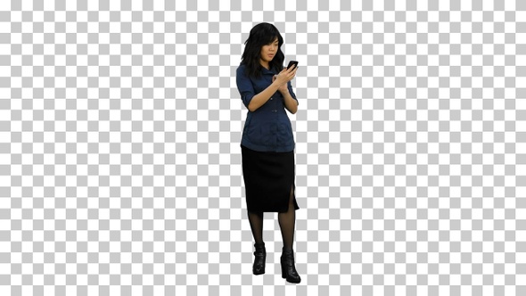 Asian businesswoman using mobile phone, Alpha Channel