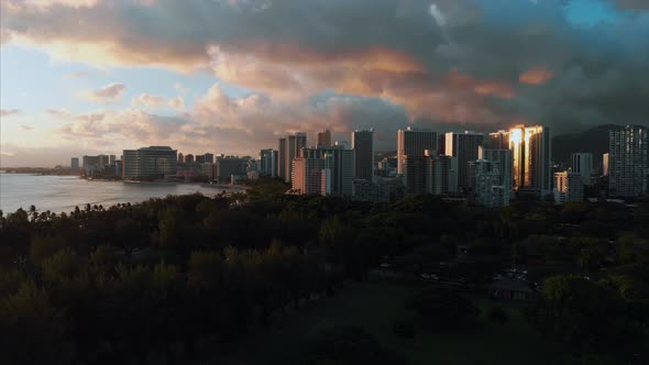 Aerial drone footage of Honolulu, Hawaii. Beautiful real estate, buildings in the city. Palm trees alt