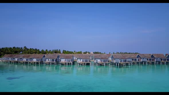 Aerial seascape of tropical coastline beach adventure by blue lagoon and white sandy background of a alt