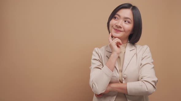 Confident business asian woman happy standing and crossed arms with copy space isolated