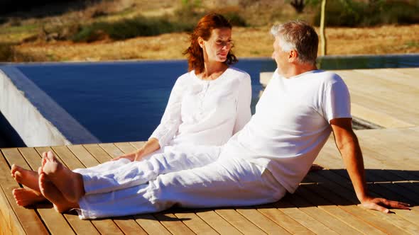 Happy couple relaxing on wooden plank 4k alt