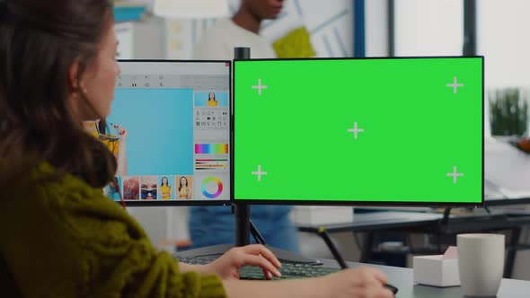 Creative Retoucher Editing Photos Using Chroma Key Display alt