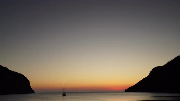 Yacht on Sea at Sunrise alt