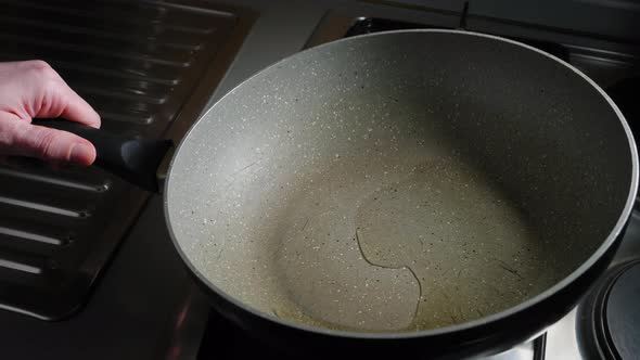 Pouring Small Amount Of Vegetable Oil Into Hot Pan, Then Add Seasoned Chicken Breast. Preparing Quic alt