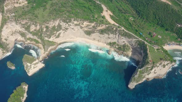 Aerial View Mesmerizing Turquoise Waves Lapping on Cozy Atuh Diamond Beach alt