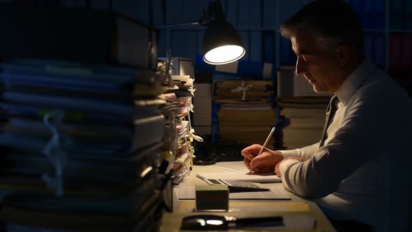 Businessman working late at night