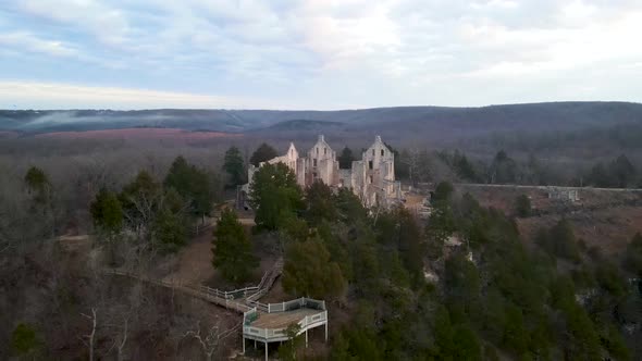 Medieval Castle Ruins in American Midwest Landscape, Aerial Approach alt