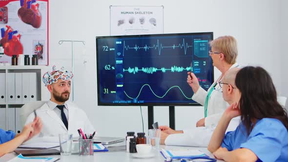 Elderly Woman Researcher Using Medical High Tech Analysing Brain Impulse alt