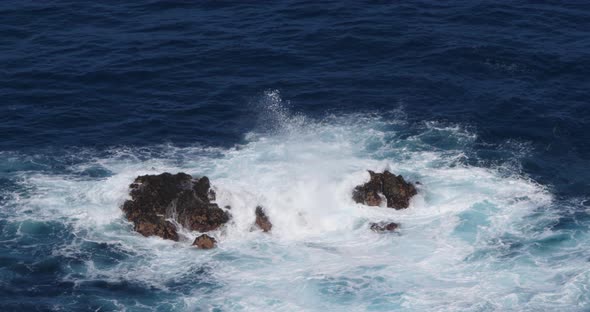 Wave crash into rock coastline, Atlantic Ocean, Porto Moniz, Madeira Island Portugal, Slow Motion 4K alt