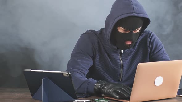 Hacker Spreading Computer Viruses or Stealing Money From Bank Card