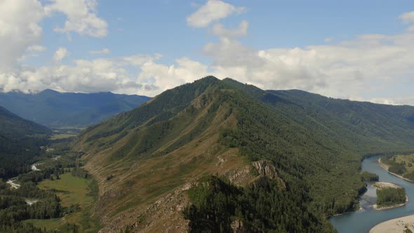 Peak of mountains of Ak-Kem valley with blue Katun river in Altai