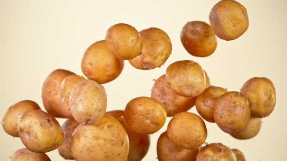 Super Slow Motion Shot of Flying Potatoes at 1000 Fps alt