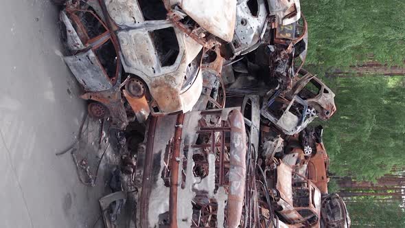 Vertical Video Irpin Bucha District  Destroyed Cars During the War in Ukraine alt