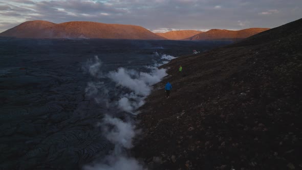 Drone Over Hikers And Cooled Lava Flow From Erupting Fagradalsfjall alt
