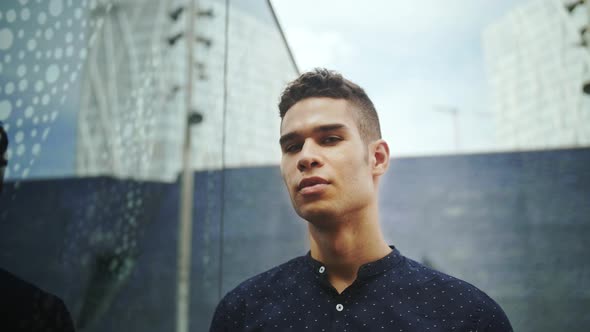 Well-Dressed Entrepreneur businessman Young Attractive Trendy Man looking into his own reflection on alt