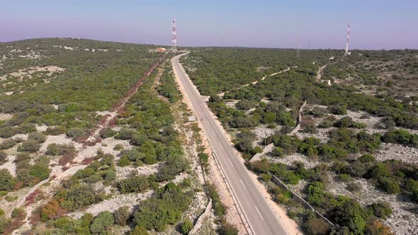 Aerial view of pro biker riding downhill at competition, Croatia.