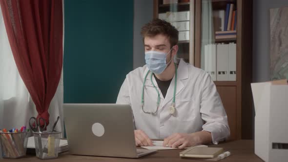 Doctor Writing Notes Consultation Video Conference in Video Chat Medical App alt