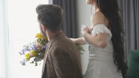 Couple Sitting on the Sofa alt