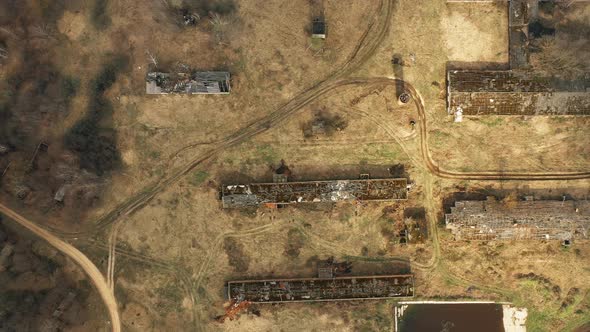 Aerial View Of Abandoned Ruined Water Tower Near Farm In Chernobyl Zone