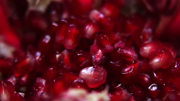 Ripe Pomegranate Fruit with Bright Maroon Grains